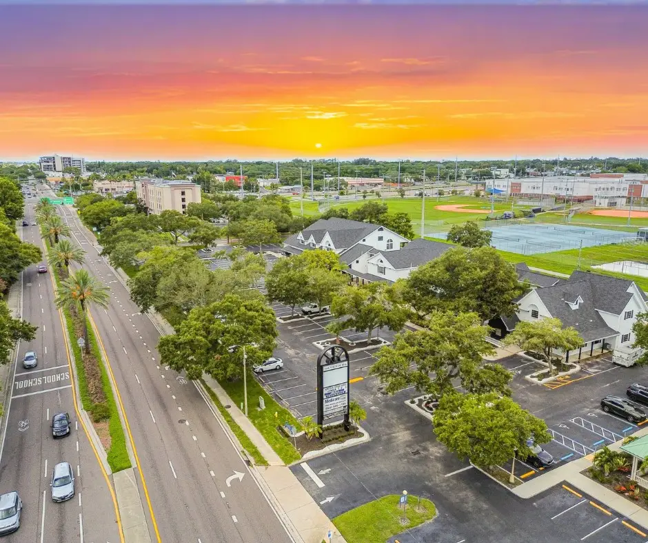 MJ Village from the air at sunset, with East Bay Drive on the left and Largo High School’s fields behind